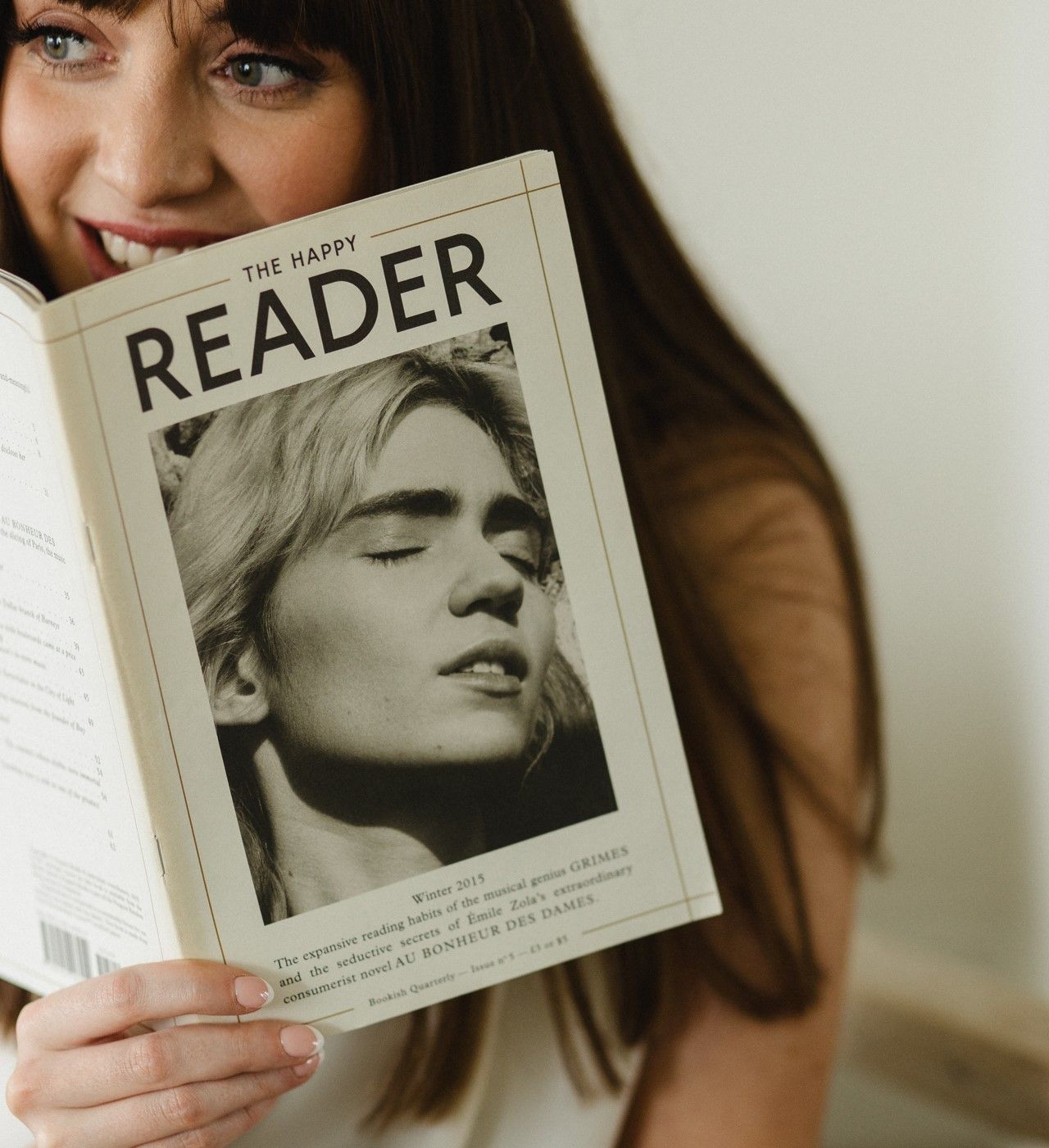 Copywriter reading to gather inspiration for a copy project | Finer Things Editorial