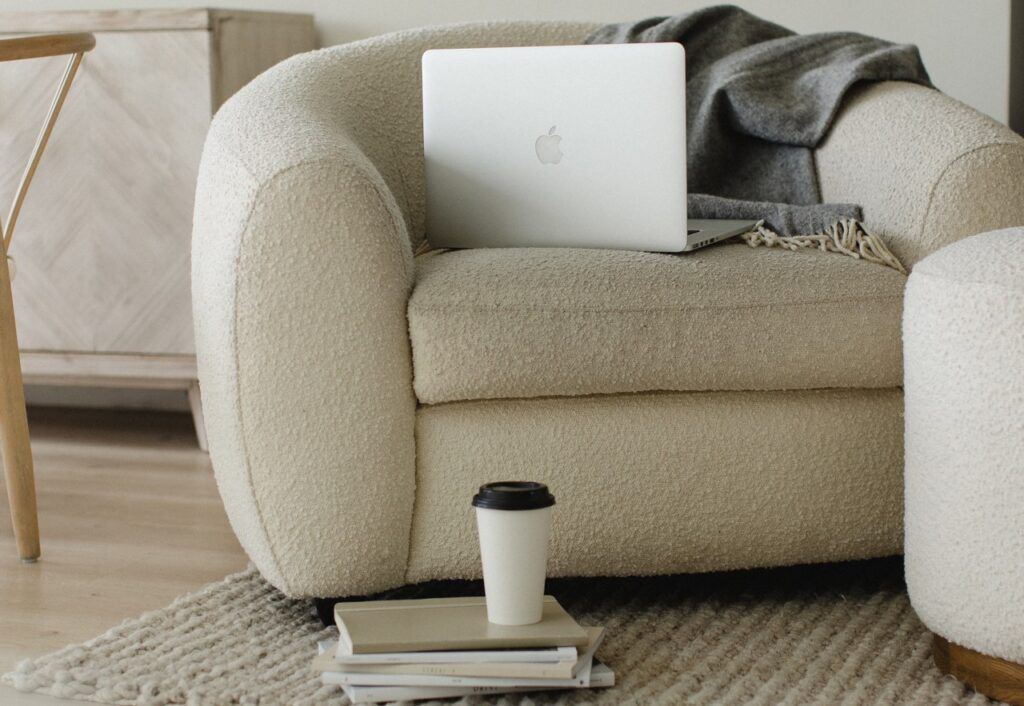 Copy editor's laptop and other editing materials | Finer Things Editorial